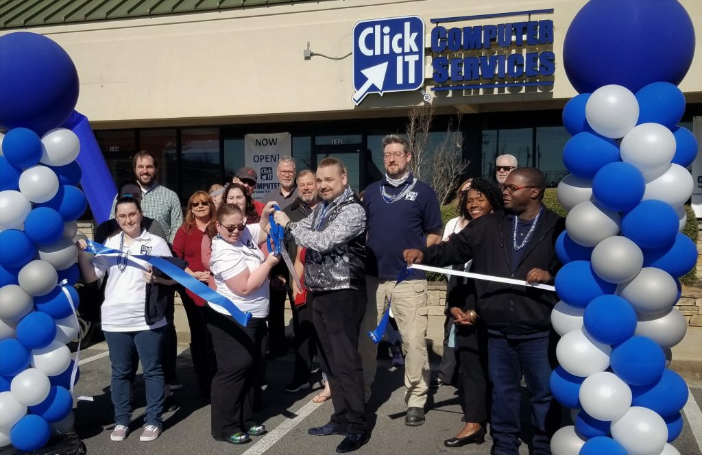Ribbon cutting at a Click IT grand opening