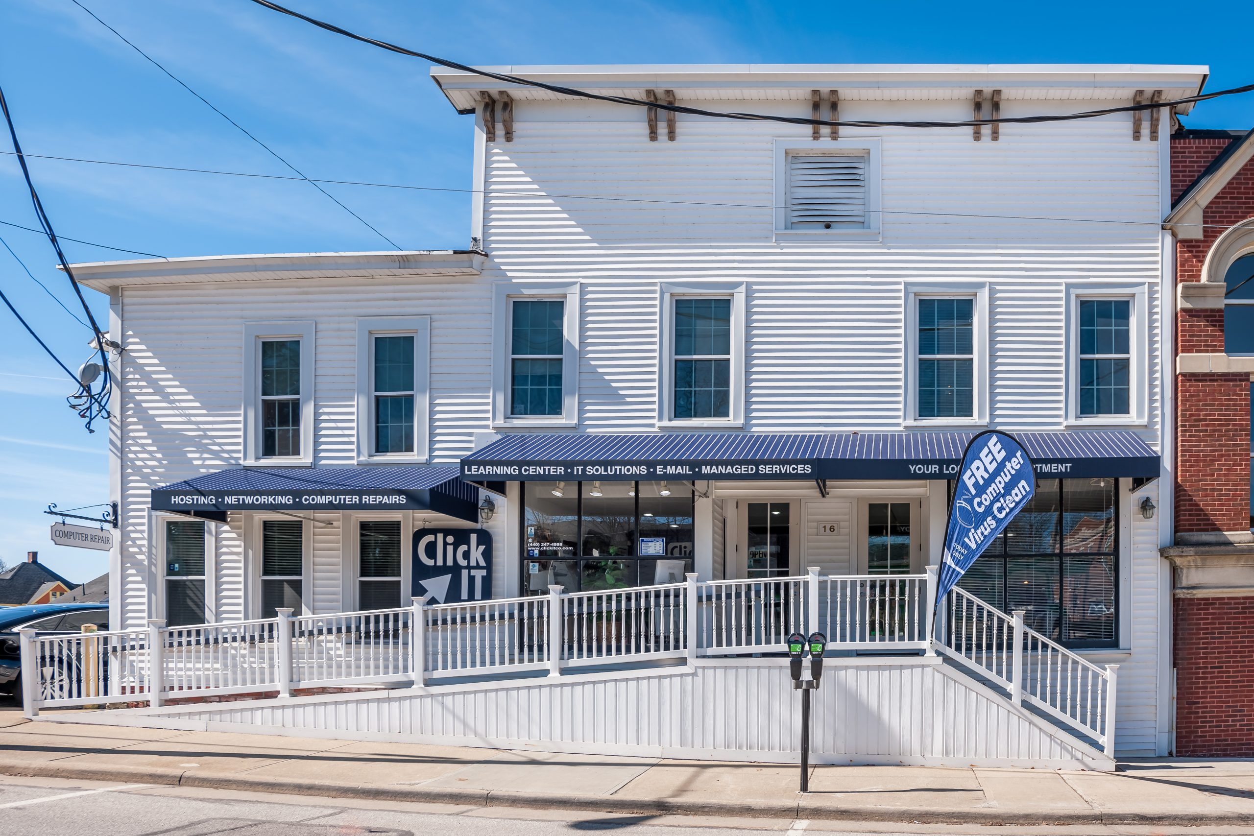 Side view of a Click IT storefront exterior